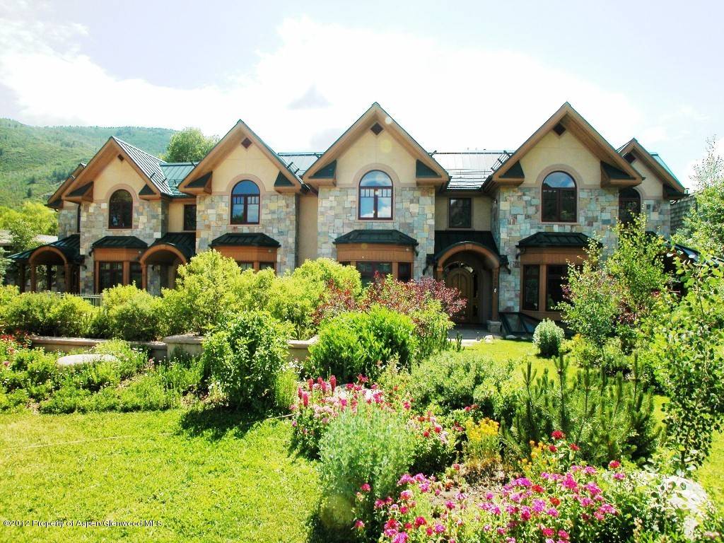 Wonderfully located town home on the Roaring Fork River, just 3.