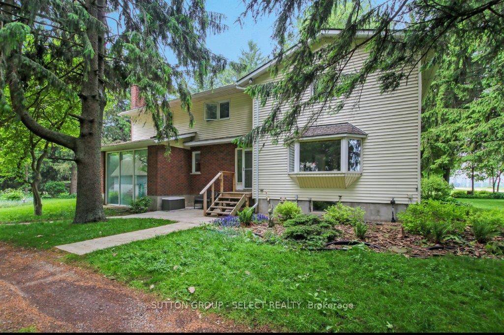Prepare to fall in love with this masterfully updated century home located between Thorndale and St Marys.