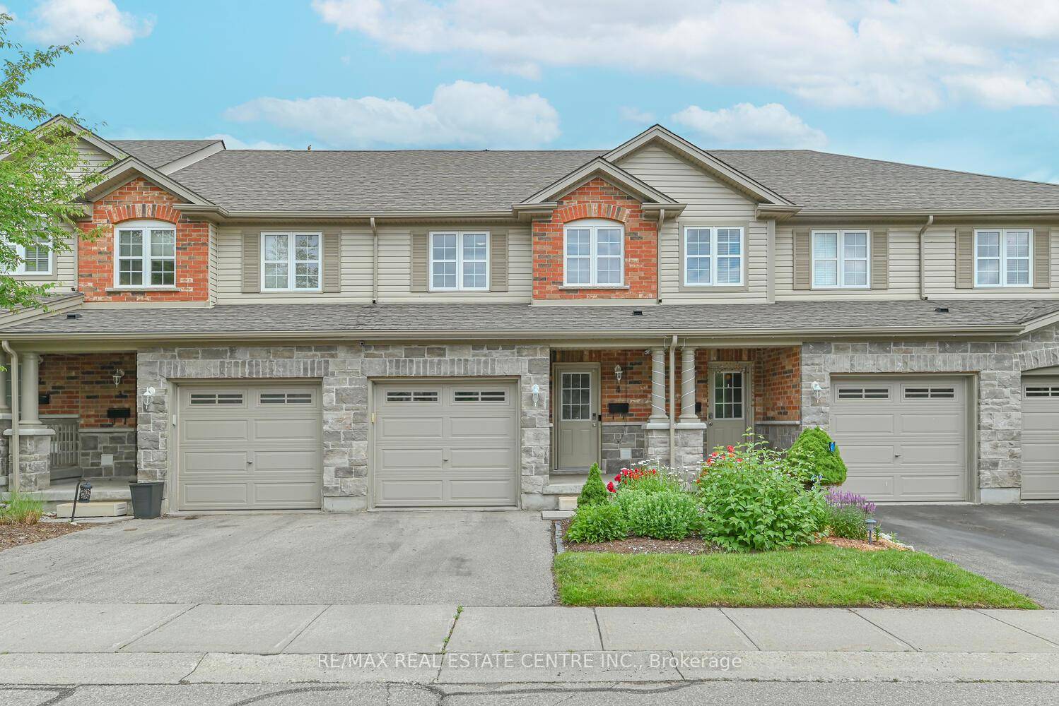 Exceptional curb appeal, beautifully upgraded, 2 storey townhome with walk out basement and backing onto a serene ravine this home has it all !