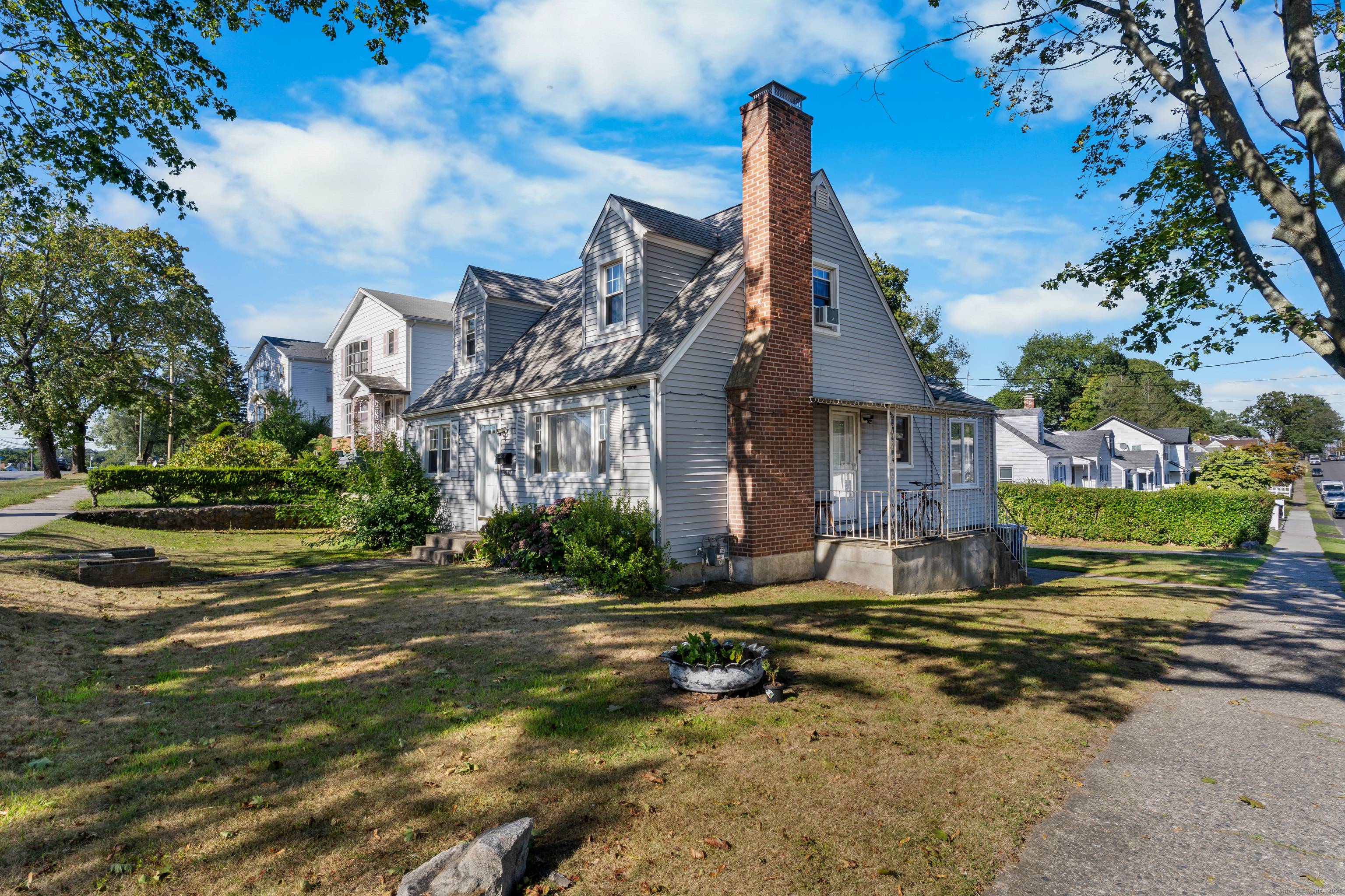 Charming Cape Style Home with Tremendous Potential !