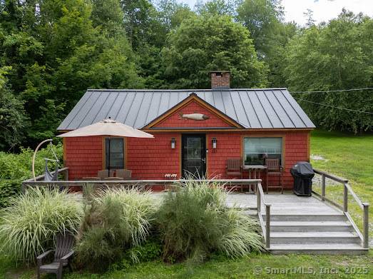 BASHAN LAKE ! This beautiful home offers a stunning lakeview and is situated on a dead end street, providing peace and tranquility.