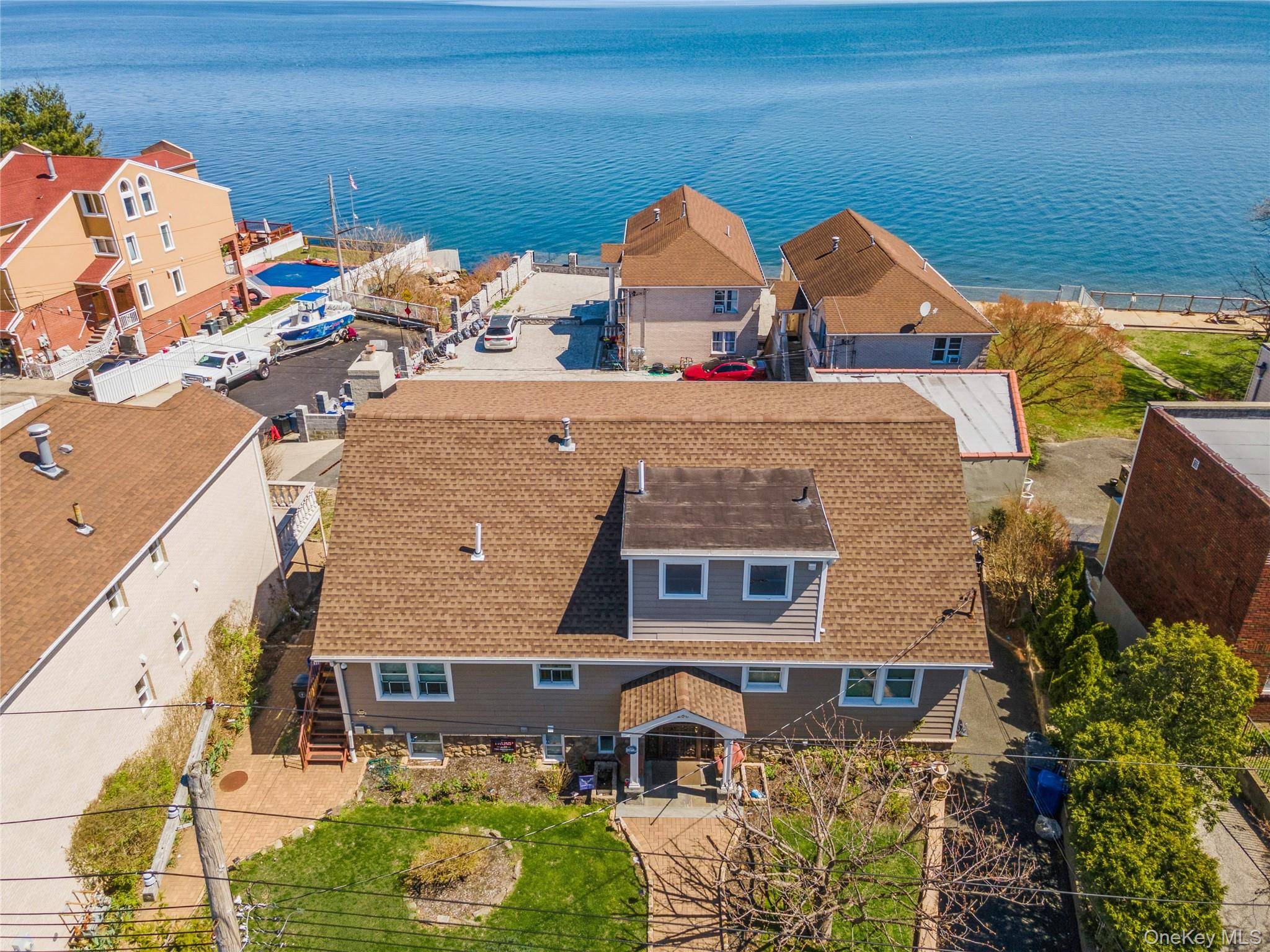 Welcome to 258 Longstreet Avenue, a waterfront duplex in the desirable community of Throggs Neck.