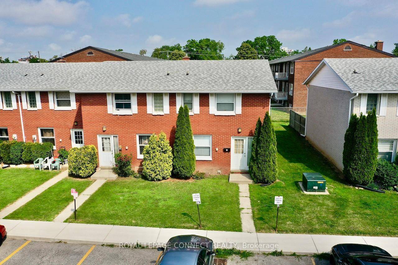 All brick centrally located well established 2 storey, 3 bedroom, 2 washroom condominium townhome with own exclusive parking, and sizeable useable unfinished basement, laundry area, and gas forced air heating.