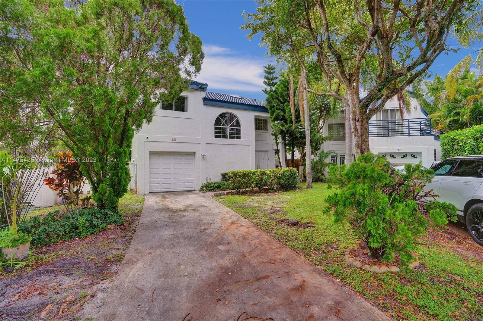 This charming two story residence in a secure gated community is perfect for families seeking comfort and convenience.