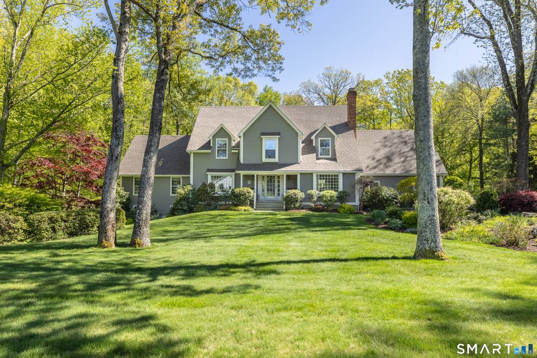Located in the sought after Berries neighborhood, this custom built Colonial originally the builder's own residence offers a rare blend of privacy, craftsmanship, and convenience.
