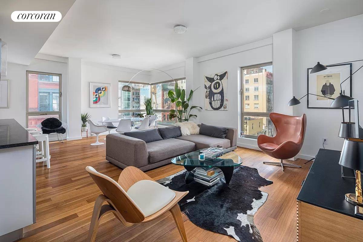 Prime NoLita full floor corner 3 bedroom with floor to ceiling double pane windows.