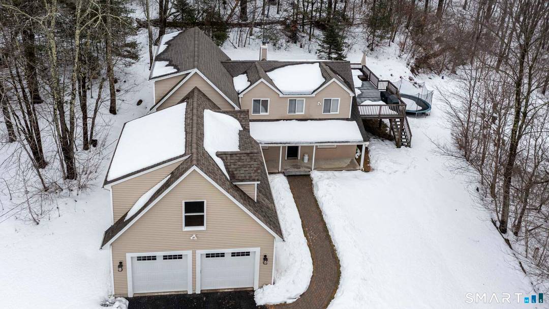 Welcome to this beautifully updated home in the heart of picturesque Morris where modern upgrades meet natural serenity.