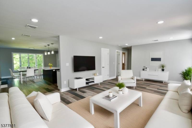 MAGNIFICENT 4 BEDROOM 3 FULL BATH 2 CAR GARAGE EXPANDED CUSTOM HOME THAT IS NICELY RENOVATED.