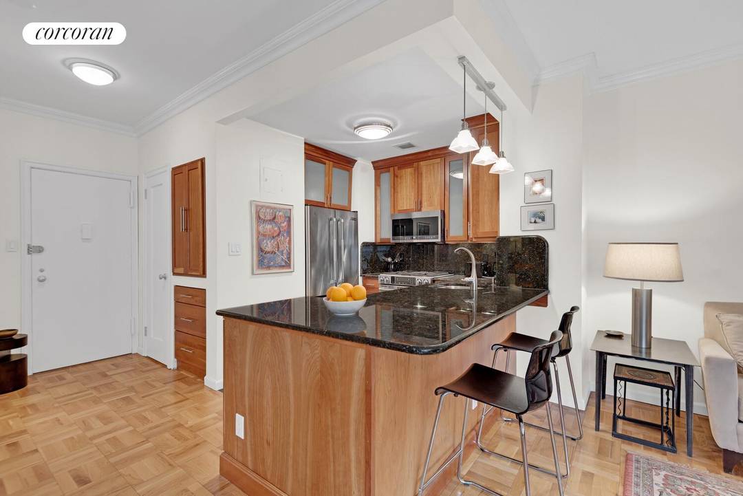 Apartment B811 is an oversized, renovated one bedroom, one and a half bathroom home with well proportioned rooms, an open kitchen, northeast exposures, lovely light, and custom fitted closets for ...