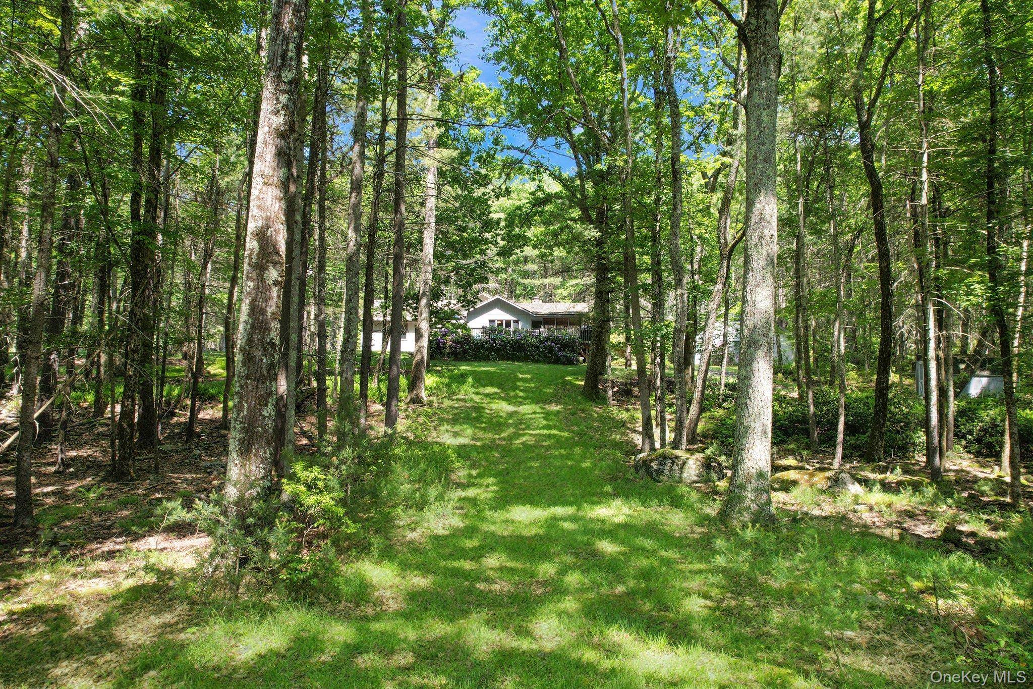 Discover serenity at this enchanting lakefront retreat on Mohican Lake.