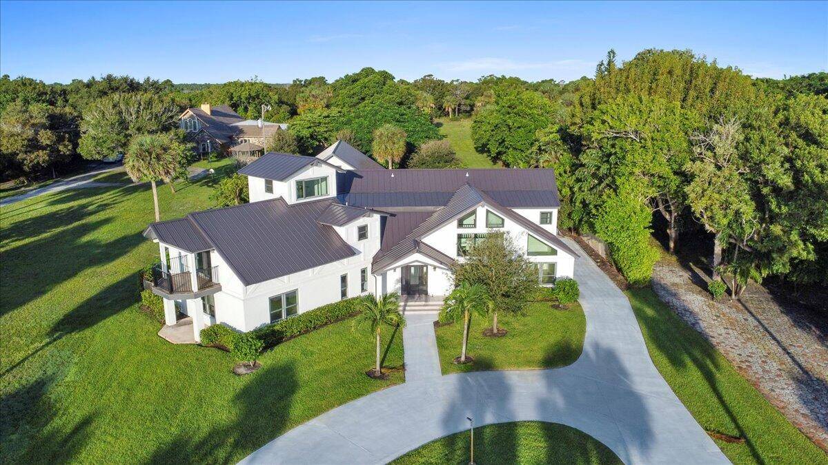 NEARLY 4 ACRES ON WIDE WATER !