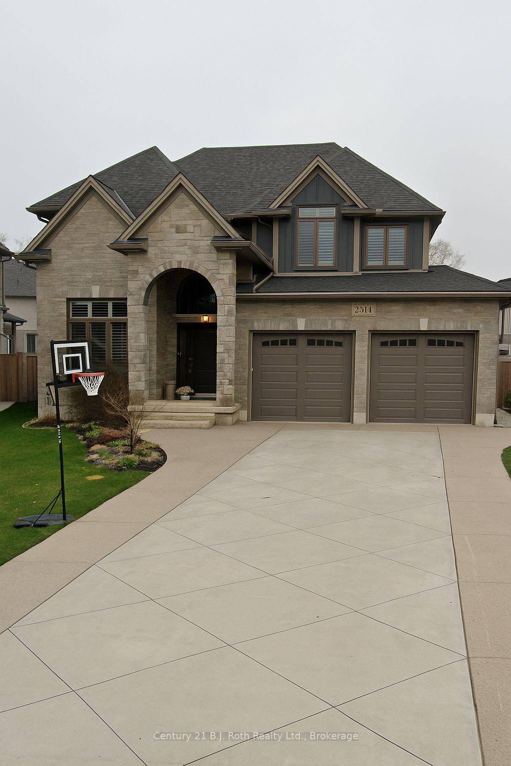 Welcome to 2314 Ballymote Way, a stunning 4 1 bedroom home nestled in the desirable Ballymote Woods community.