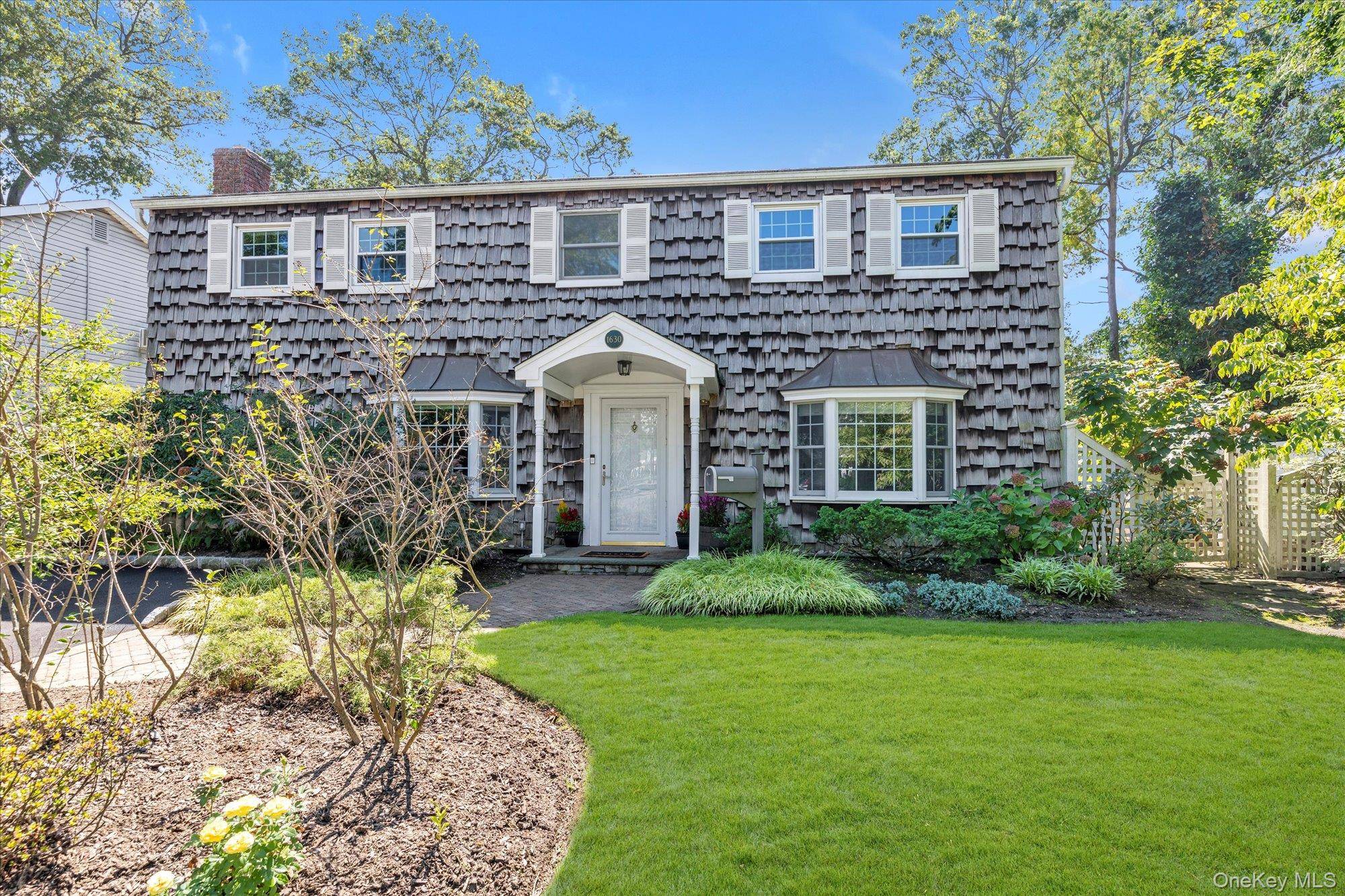 Welcome To This Charming And Spacious 4 Bedroom, 2 Bathroom Expanded Cape, Perfectly Situated In The Highly Sought After Wantagh Woods Neighborhood.