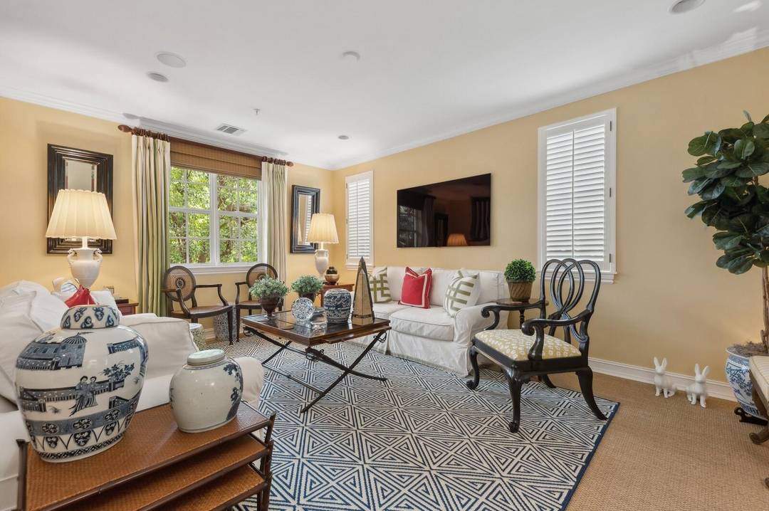 Presenting the sunniest most private townhouse at Magnolia Court.