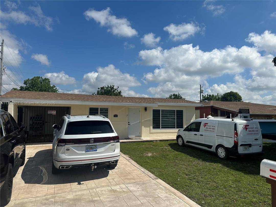 Beautifully Updated 2 1 Single Family Home on Oversized Corner Lot !