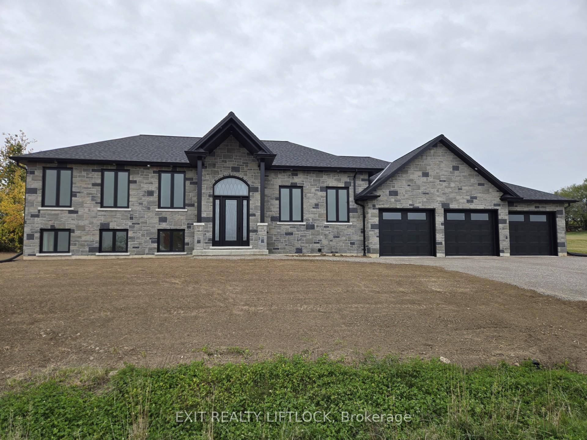Currently Under Construction Custom built executive stone bungalow by Davenport Homes in the rolling hills of Cavan.