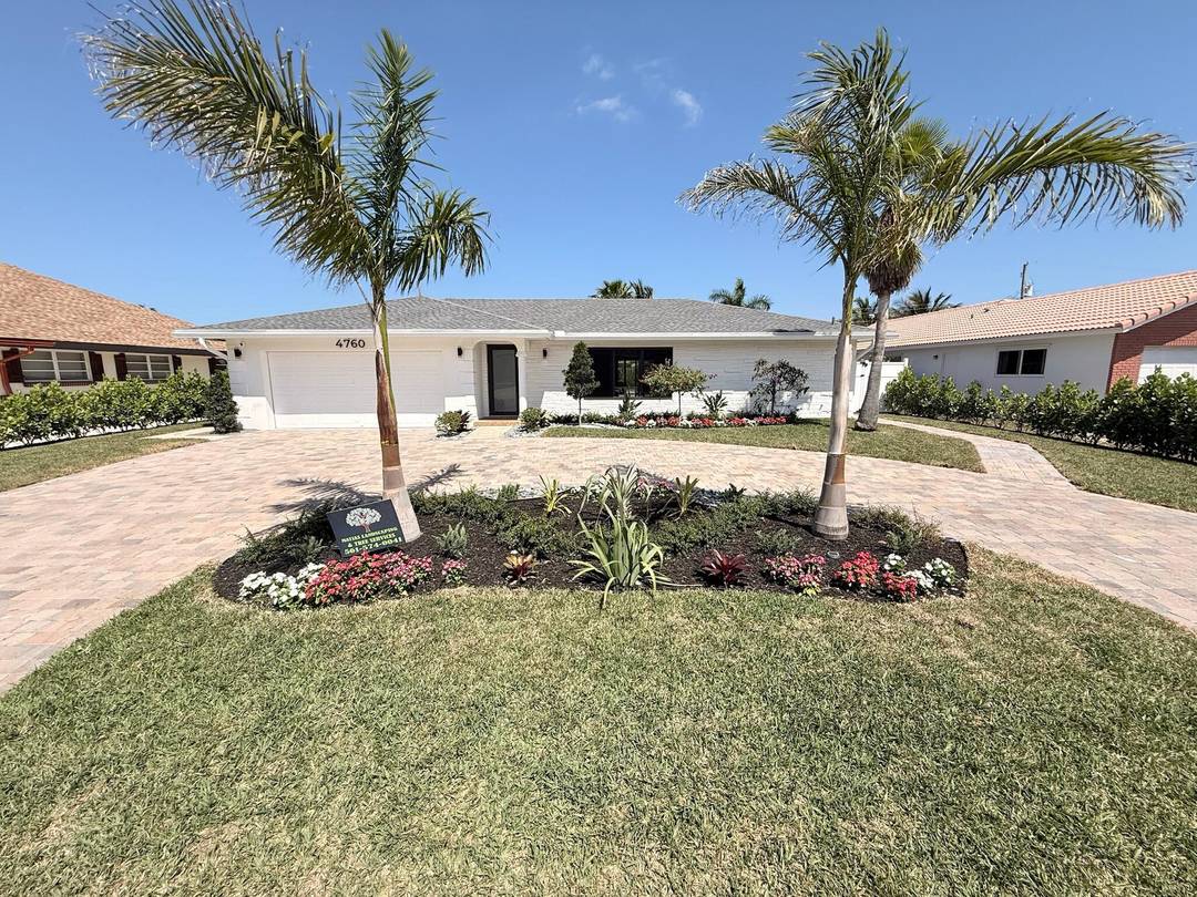 Tastefully remodeled 3 2 pool home with 2 car garage located on a quiet street in the desirable East Boca Raton less than a mile from beautiful beaches.