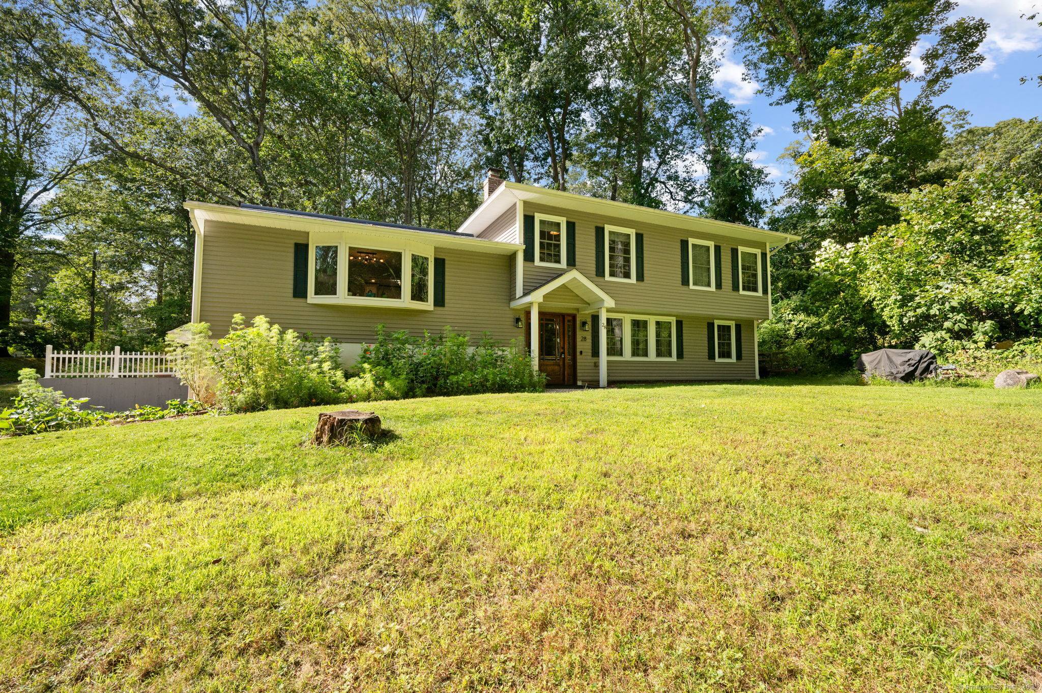 Welcome to this charming and spacious 4 Bdrm, 2.