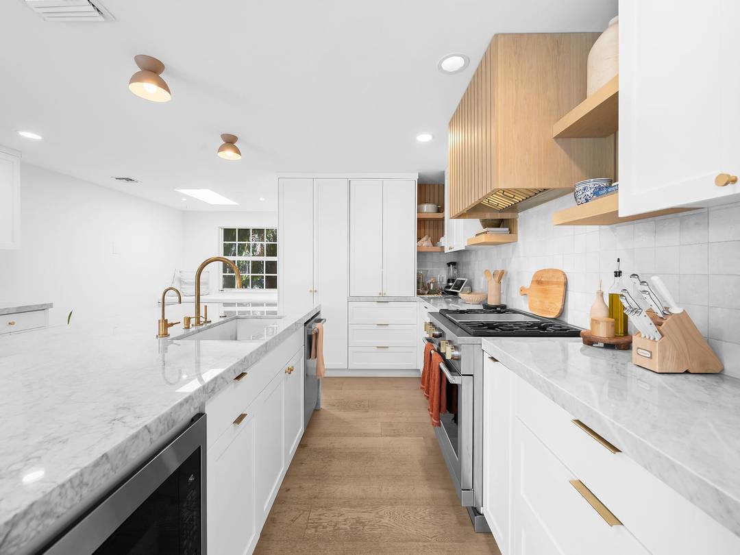 This beautifully updated residence blends modern design w relaxed elegance, the perfect backdrop for life near the beach.