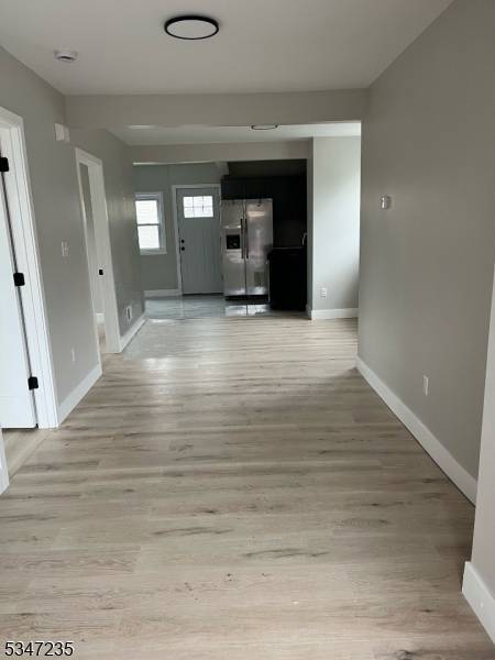 RENOVATED 2 FAMILY HOME OFFERING LIVING RM, EAT IN KITCHEN, 2 BEDROOMS BATH IN EACH UNIT.