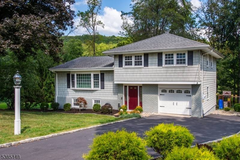 This open and bright home in a highly desirable Morris Plains location combines comfort, style, and convenience.