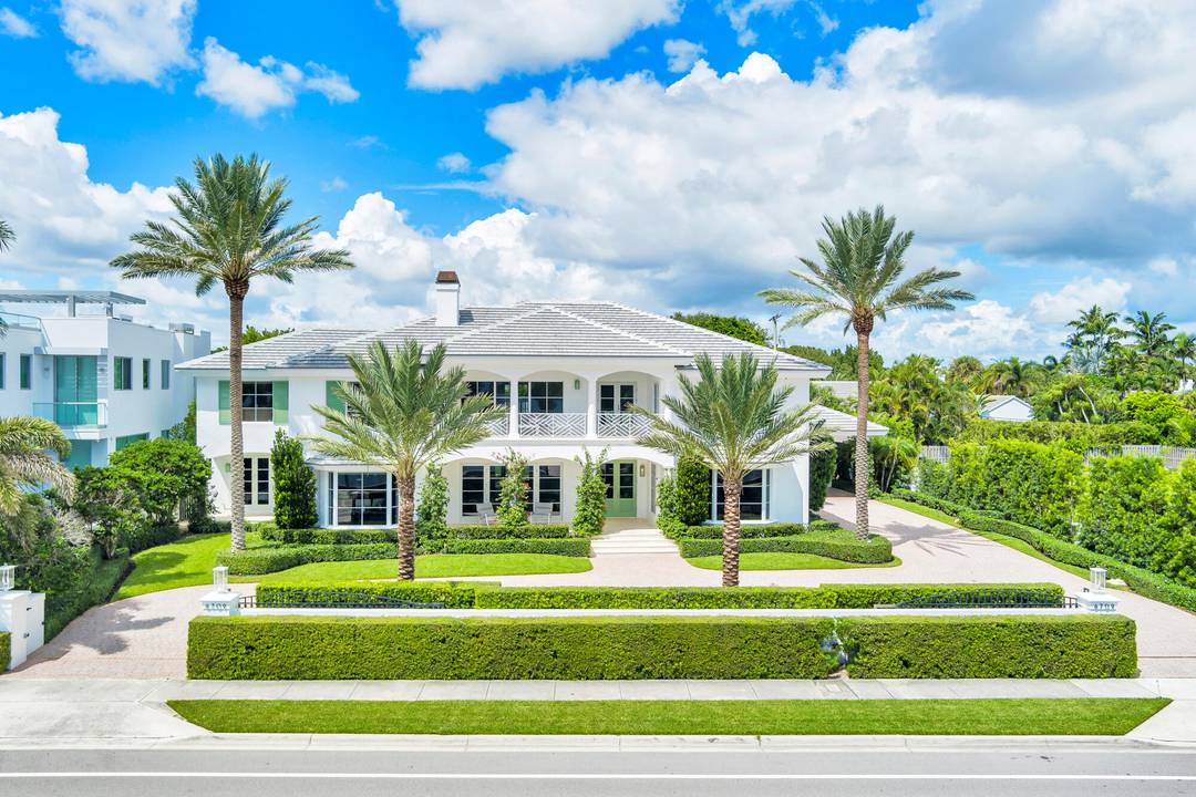 Situated on a rare. 45 acre lot with a private dock and 120 ft of frontage on the Intracoastal Waterway, this 5 bedroom, 5.
