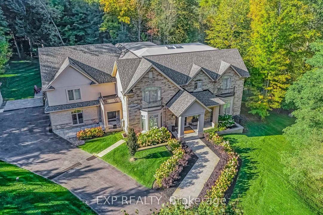 Nestled On Two Private, Treed Acres Within An Exclusive Cul De Sac Where Homes Are Rarely Available, This Sensational Custom Estate Presents An Unparalleled Lifestyle Of Privacy And Luxury.