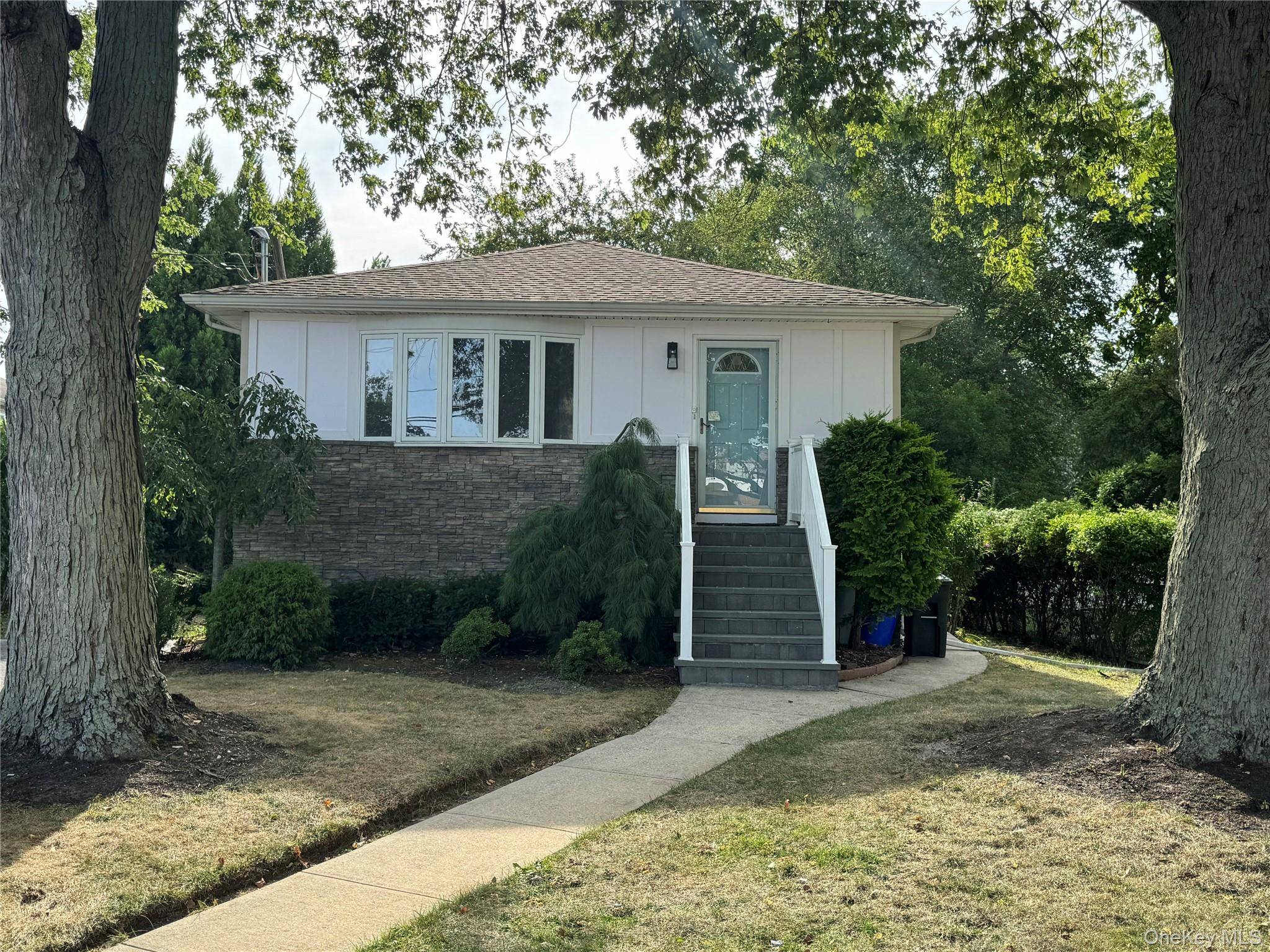 Move right in to this completely renovated 3 bedroom, Ranch featuring modern updates and easy one level living.