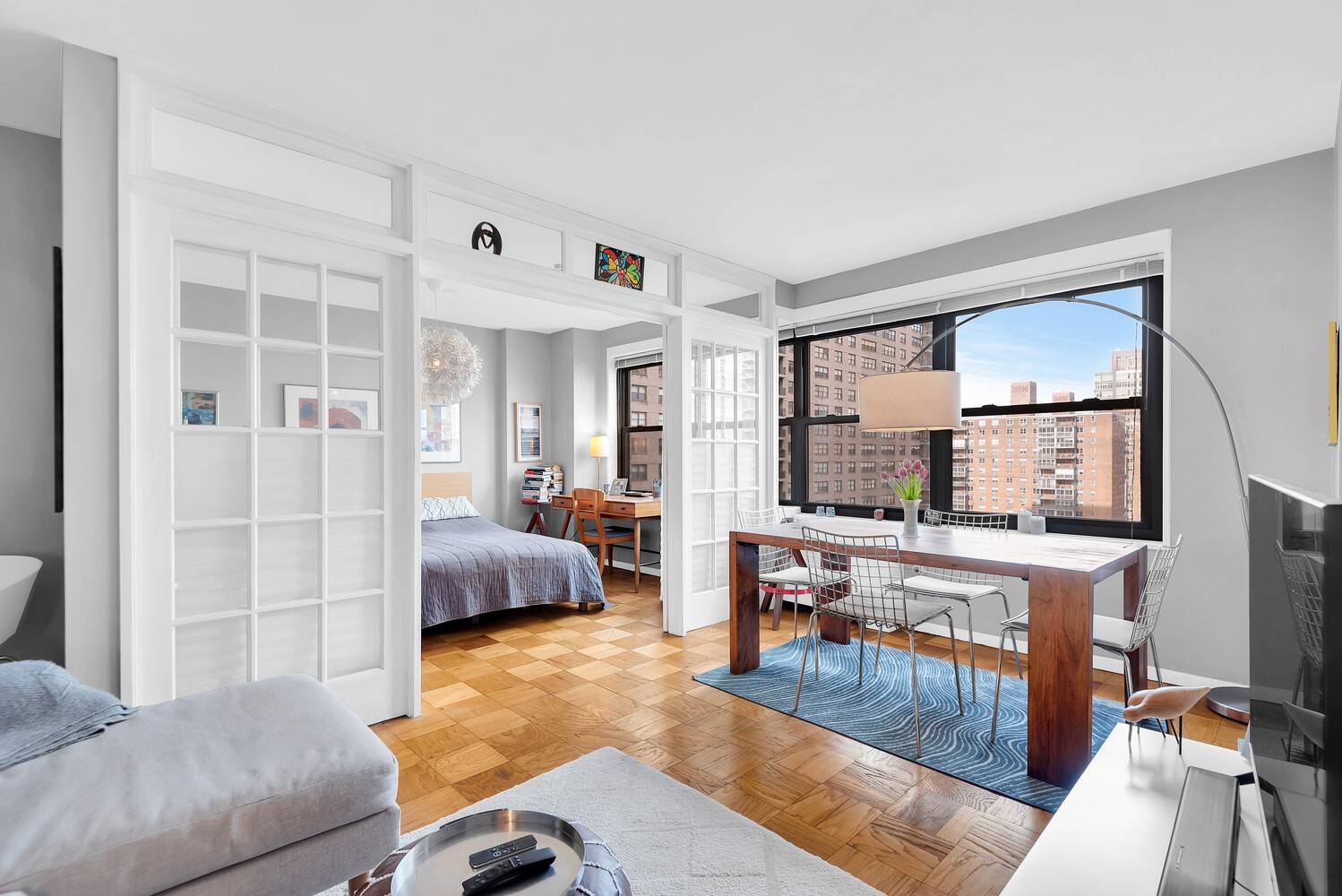 Step into this beautifully renovated alcove studio at Lincoln Towers that lives like a one bedroom.