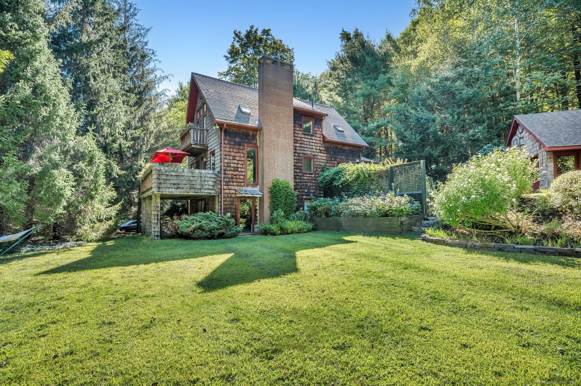 Nestled out of sight with complete privacy is this West Cornwall home with a traditional wood exterior but with a light filled modern interior !