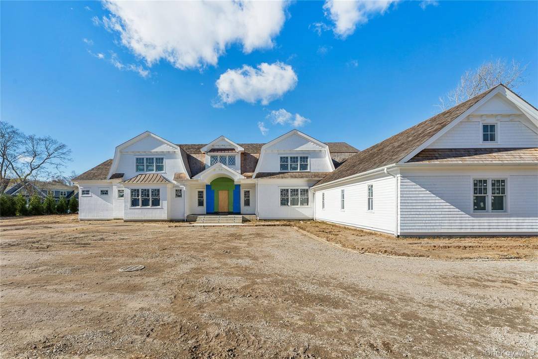 Nestled in the picturesque community of Westhampton Beach, this stunning seven bedroom home combines luxurious living with the charm of coastal life.