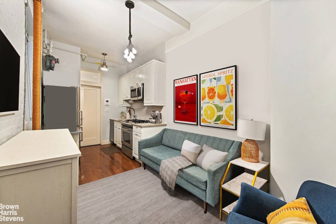 Apartment 1A is a beautifully renovated 2 bedroom, 1 bath home tucked within an intimate prewar Beaux Arts co op on a quiet, tree lined block.