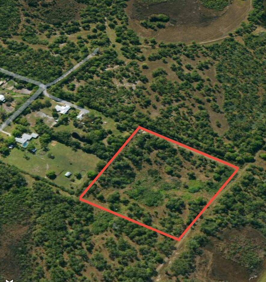A rare opportunity is available to acquire nearly 10 acres on a paved road in Palm City, featuring mature Oaks, pines, and Sabal Palm trees that enhance the property's secluded ...