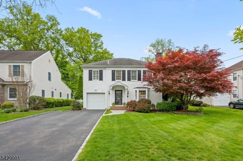 Quintessential Colonial in the sought after Deerfield section of Short Hills, this updated home offers timeless charm, modern comfort, open concept flow, and exceptional indoor outdoor living.