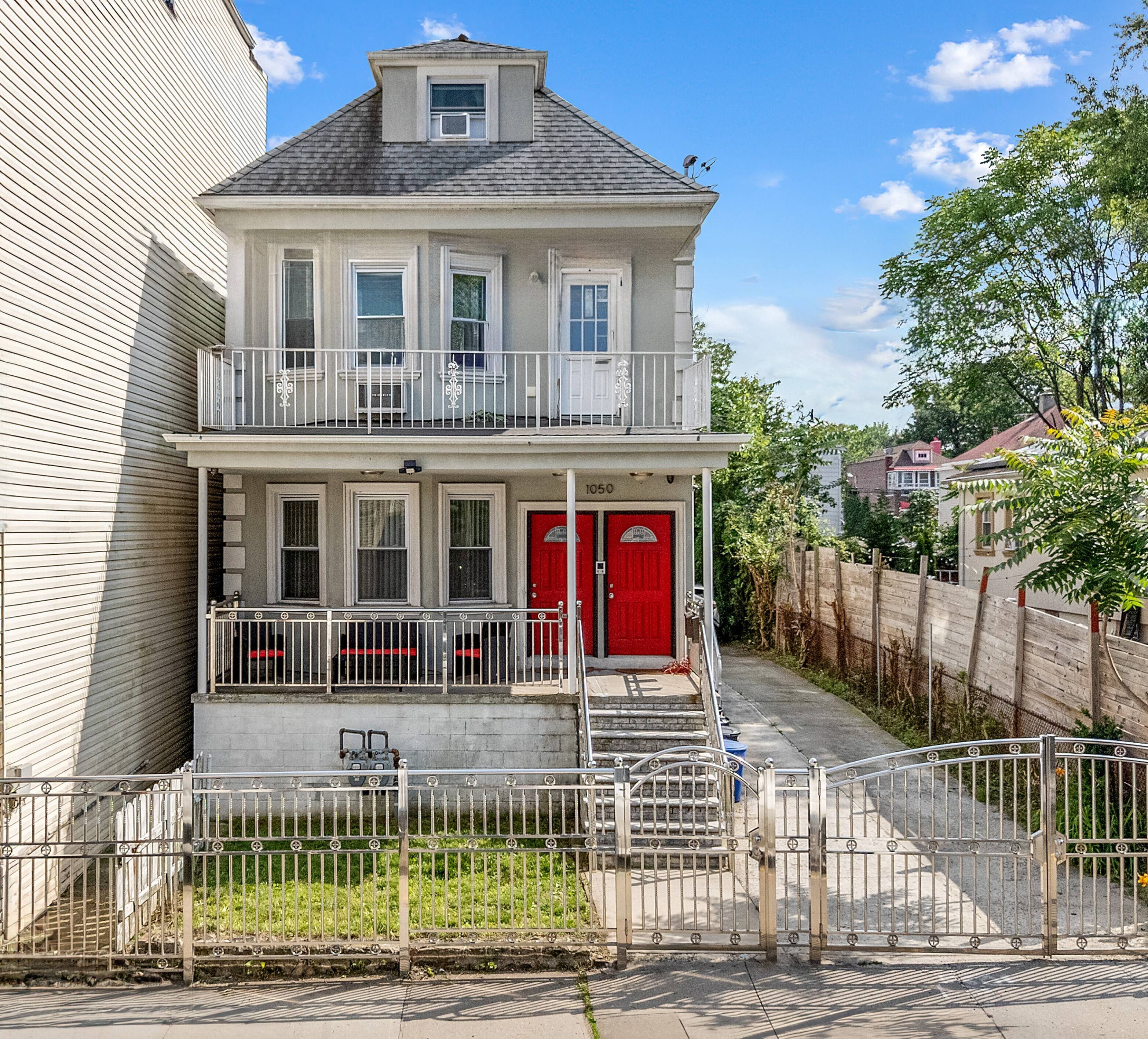 Welcome to 1050 East 232nd Street A Modern Two Family 4 level, Gem in the Heart of Wakefield, NY.