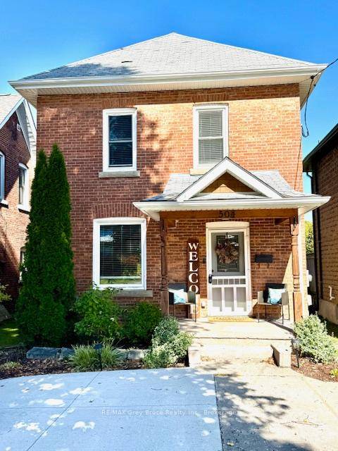 Beautifully updated 2 1 2 storey brick home on the Pottawatomi River.