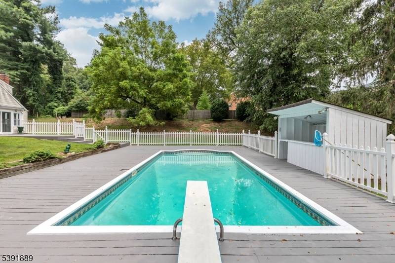 Freshly painted. Sunny, resort style open concept large home on a cul de sac with an in ground heated swimming pool with deck all in the great town of Chatham ...