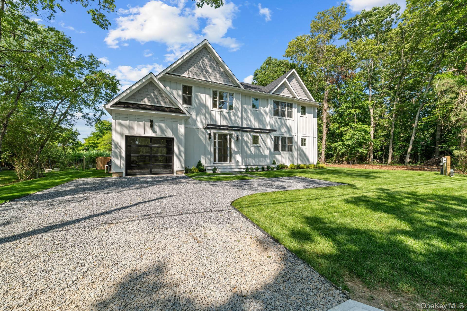 NEW CONSTRUCTION, MOVE IN READY Experience the pinnacle of sophisticated coastal living in this exceptional, newly completed home, now available for the first time.