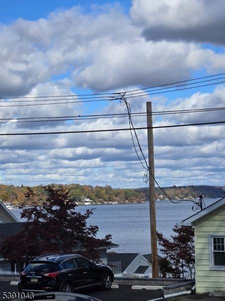 Completely Renovated Bertrand Island Beauty !