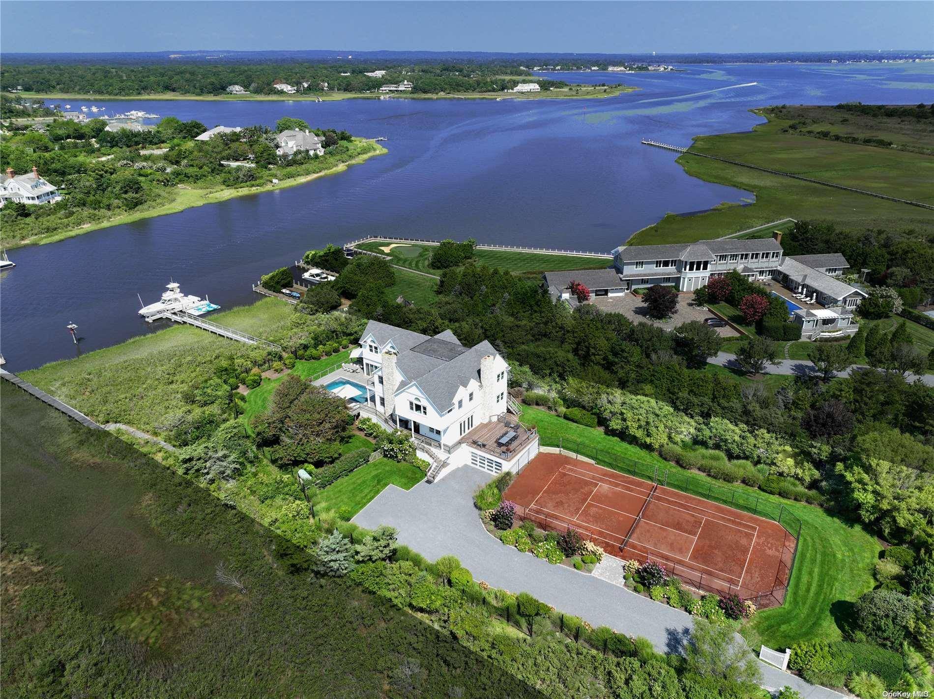 Step into a realm of pure Resort Style living and waterfront splendor within this newly designed Hamptons Bayfront masterpiece.