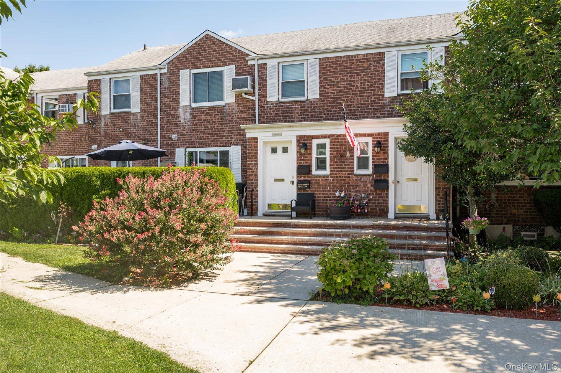 Spacious and move in ready, 2 bedroom G unit in Glen Oaks Village, in the largest gazebo courtyard in the development.