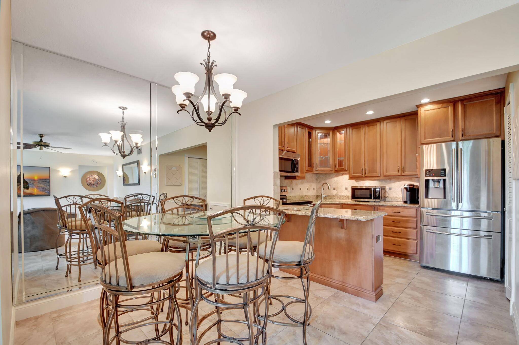 Experience unparalleled resort style living and value in this meticulously renovated 2 bedroom, 1 and a half bathroom 2nd floor unit where even the furniture is included !