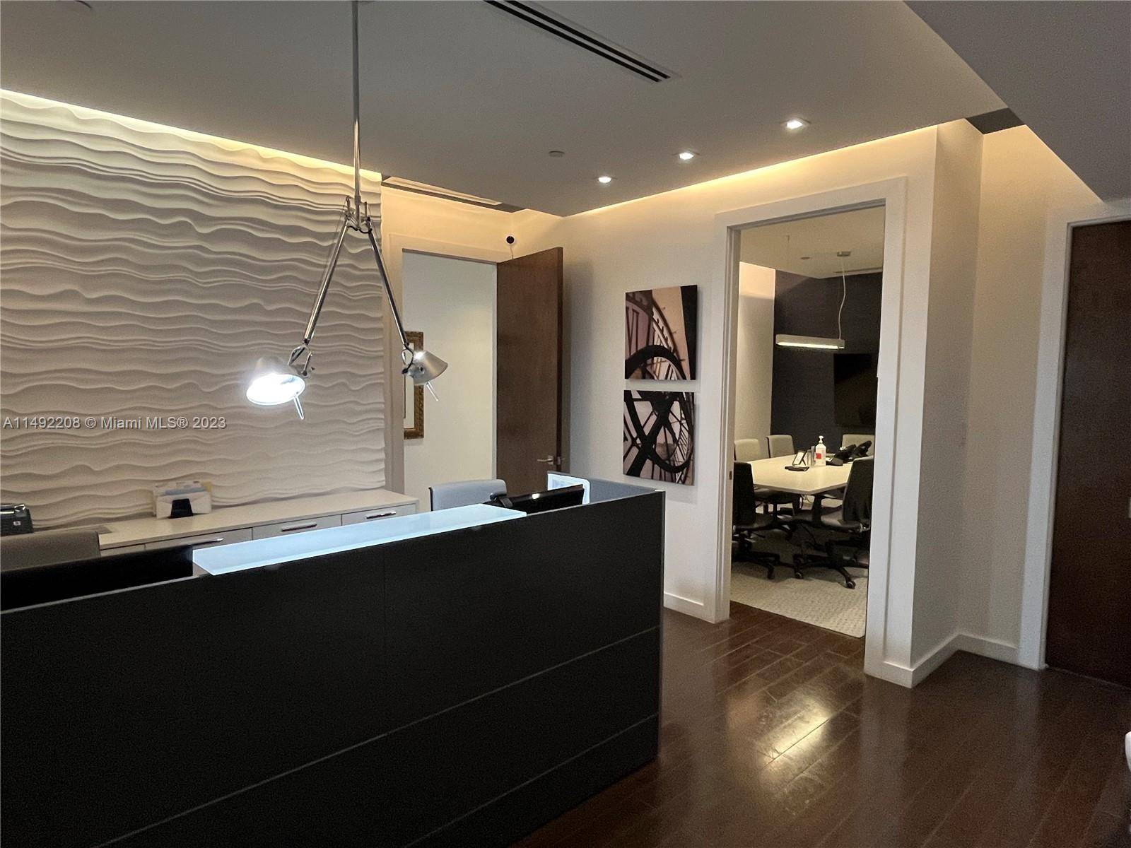 Condominium offices. The building has 24 hour access, gym, wi FI, a lobby with a 20 foot ceiling, ample parking, individual meters, and climate control.