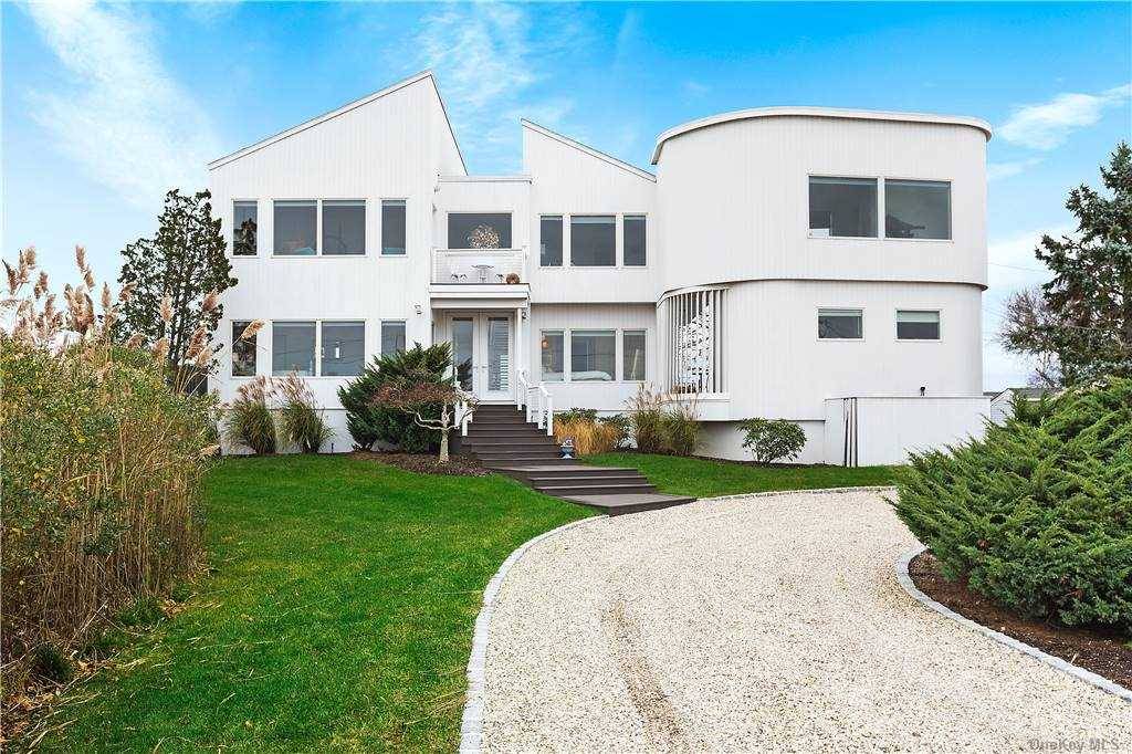 Completely renovated in 2017, this immaculate contemporary is the perfect vacation spot.