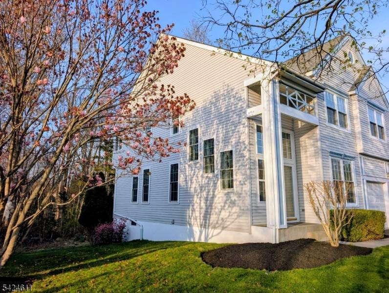 Bright and sunny 4 bedroom home in the tree lined Woodsedge neighborhood.