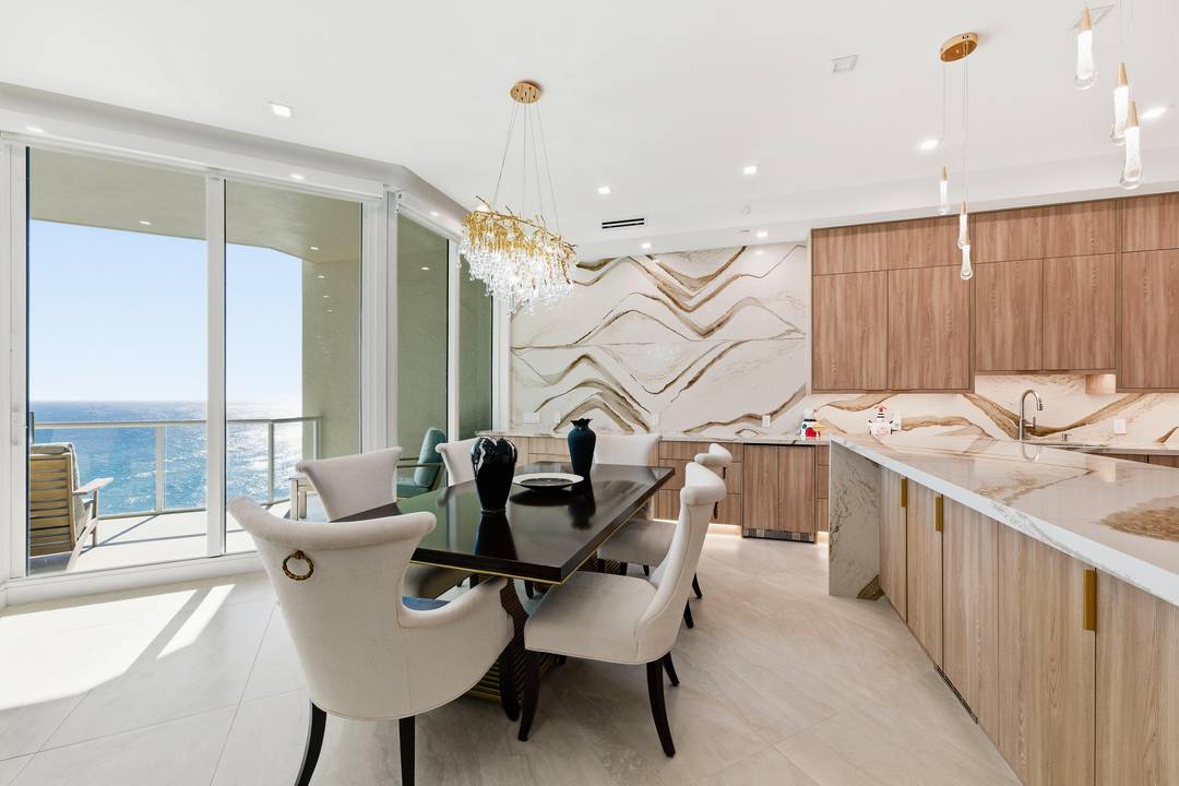 Rare opportunity Own a spectacular, completely renovated eighth floor residence on the iconic Hillsborough Mile.