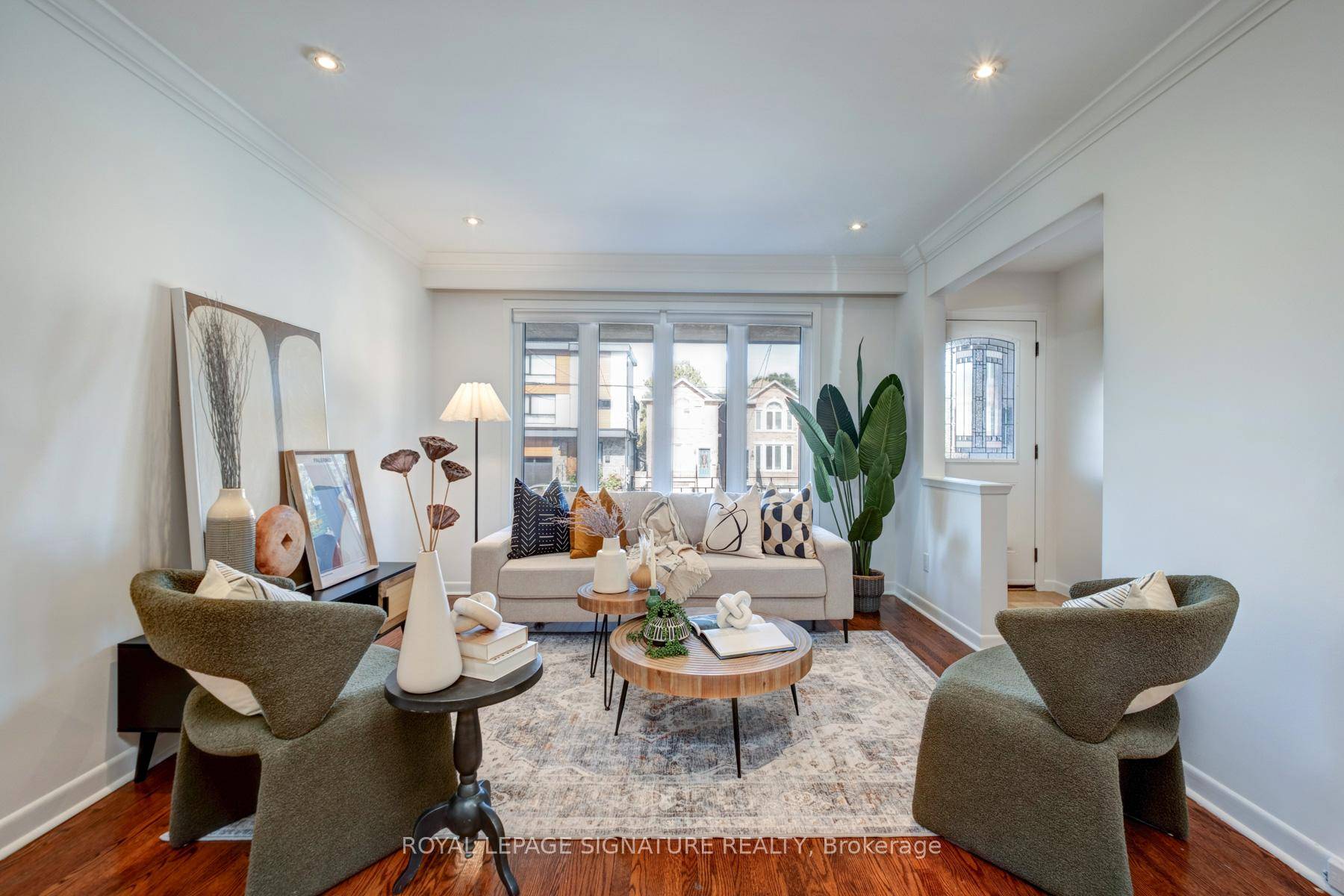 Welcome to this beautifully maintained solid brick semi that truly has it all.