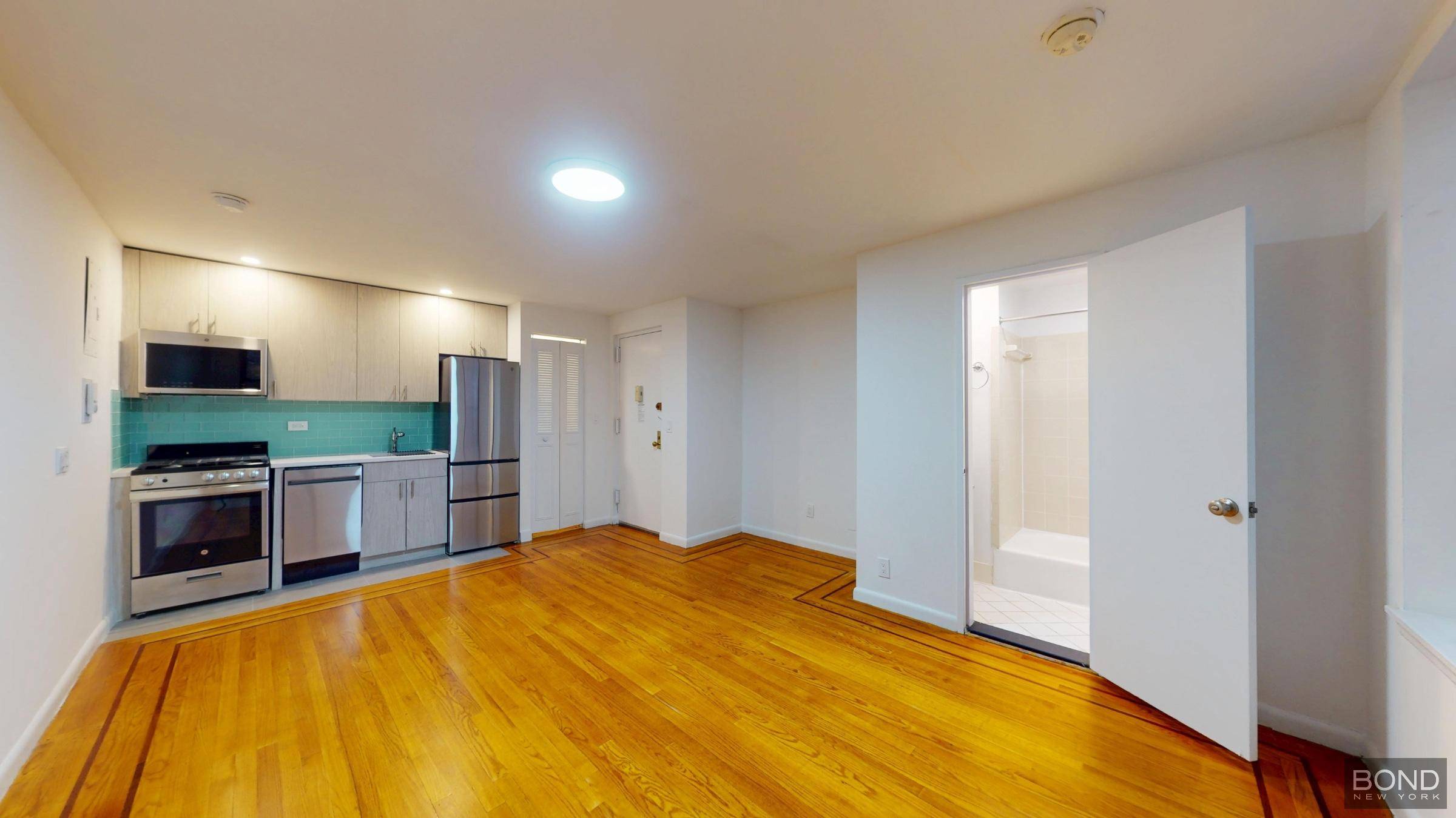 Renovated studio apartment features spacious living space, brand new kitchen with stainless steel appliances and a dishwasher, good closet space, hardwood floor and high ceilings.