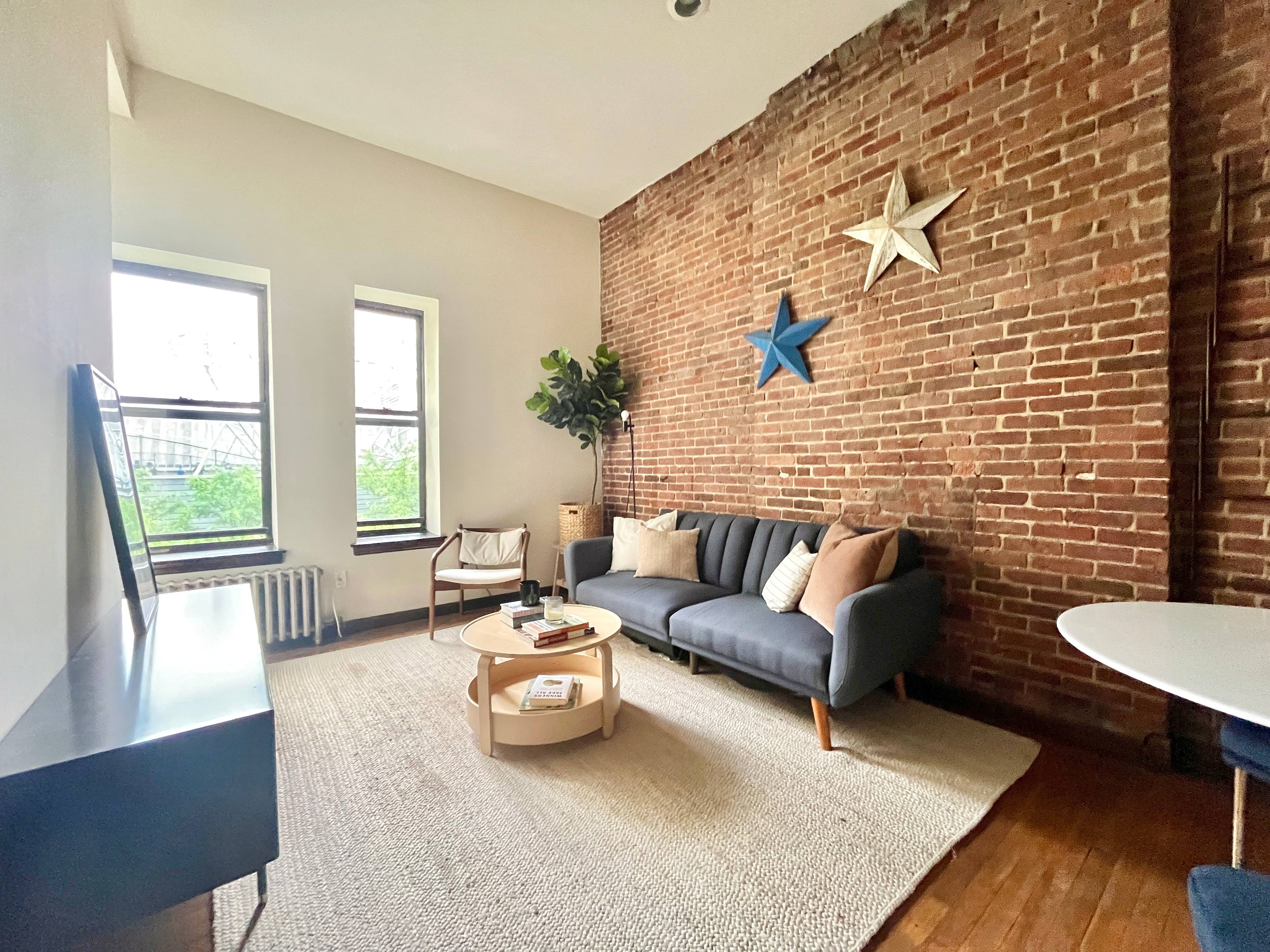 Top Floor duplex one bedroom plus windowed home office and private roofdeck.