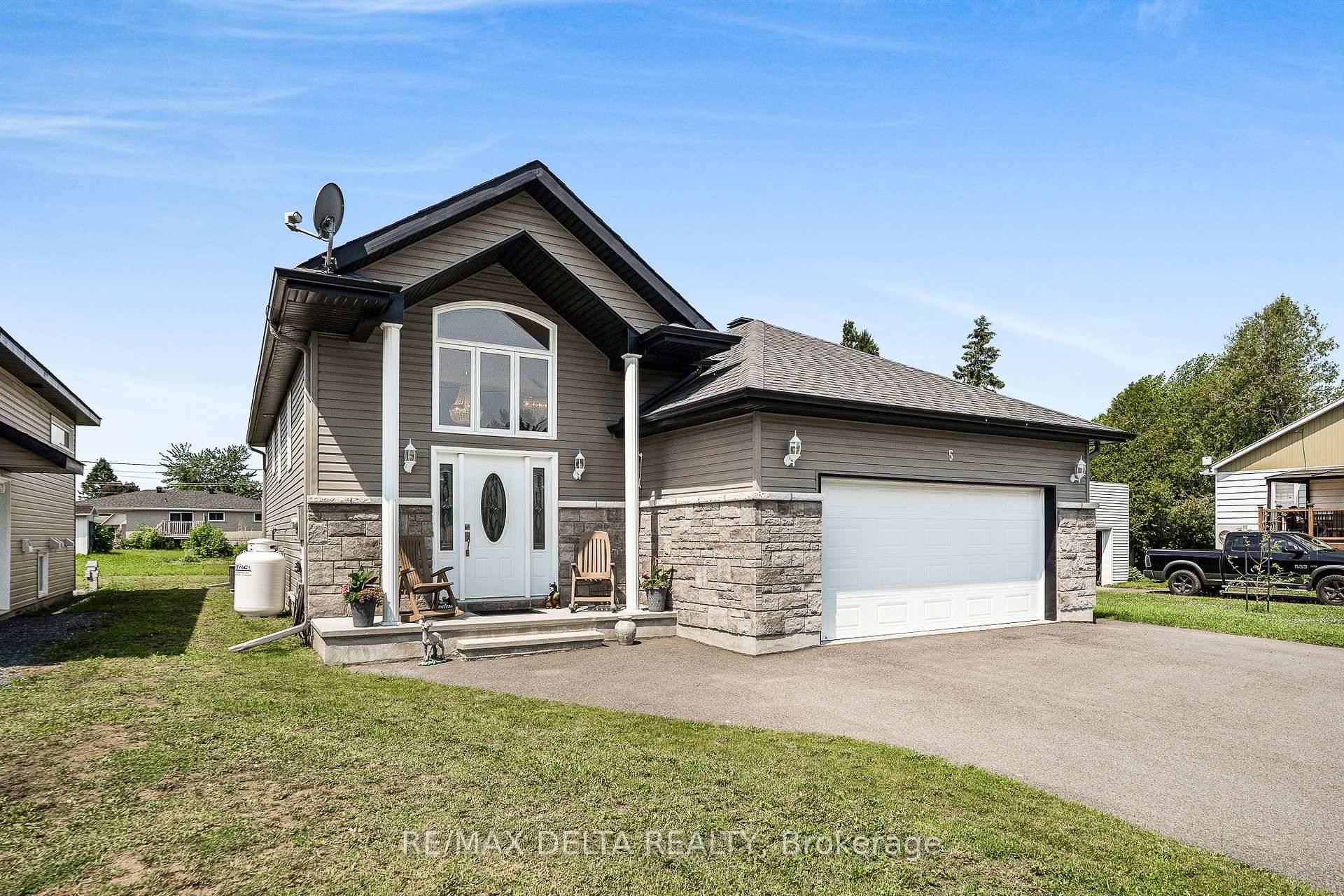 Built in 2018, this spacious home offers over 1300 sq ft each on the main floor and finished basement ideal for large families.